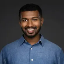 Vignesh Mohankumar logo